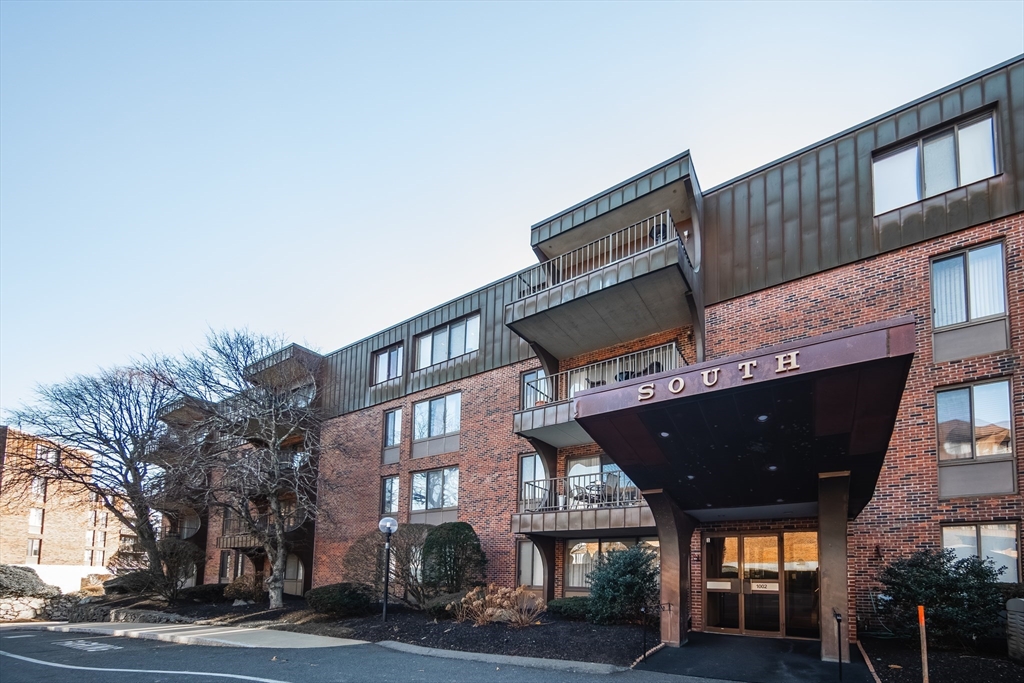 1002 Paradise Road, Unit PHE Swampscott, MA 01907 - Photo 1 of 23 a view of a building with a street