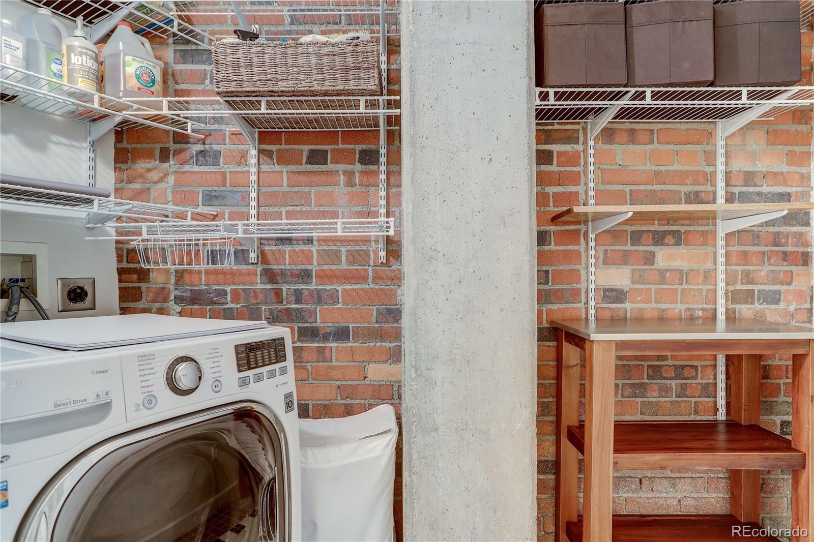 2500 Walnut Street, Unit 212 Denver, CO 80205 - Photo 15 of 39 a utility room with dryer and washer