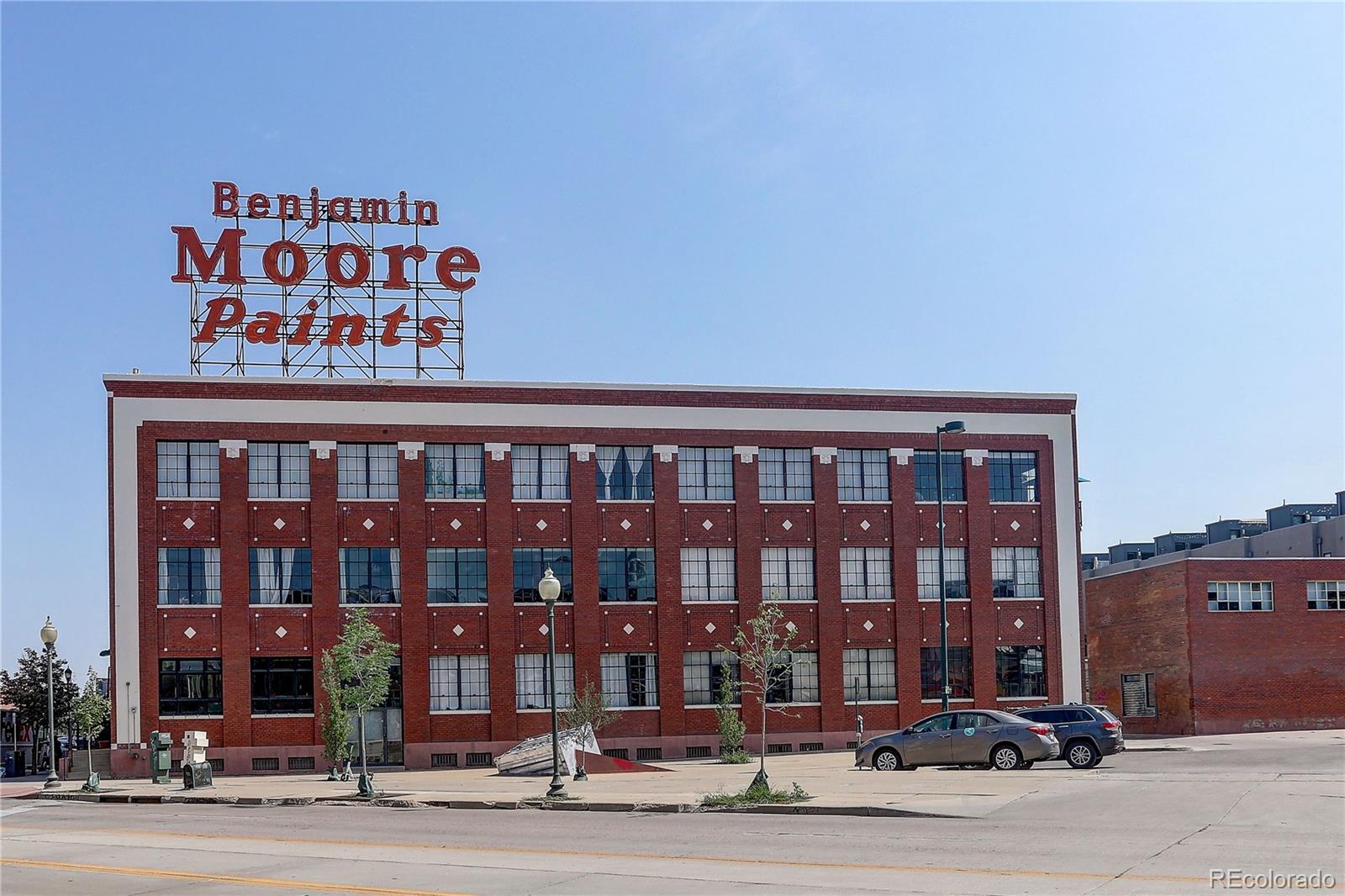 2500 Walnut Street, Unit 212 Denver, CO 80205 - Photo 2 of 39 a front view of a building with street view