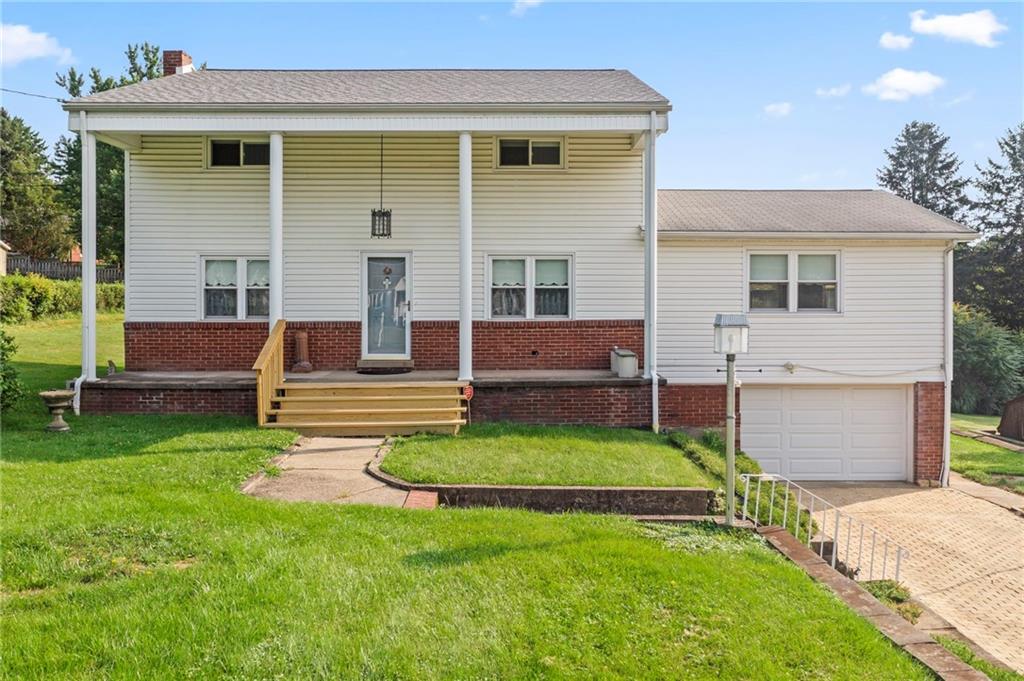 17 Ellen Drive McKees Rocks, PA 15136 - Photo 1 of 31 a front view of a house with a yard