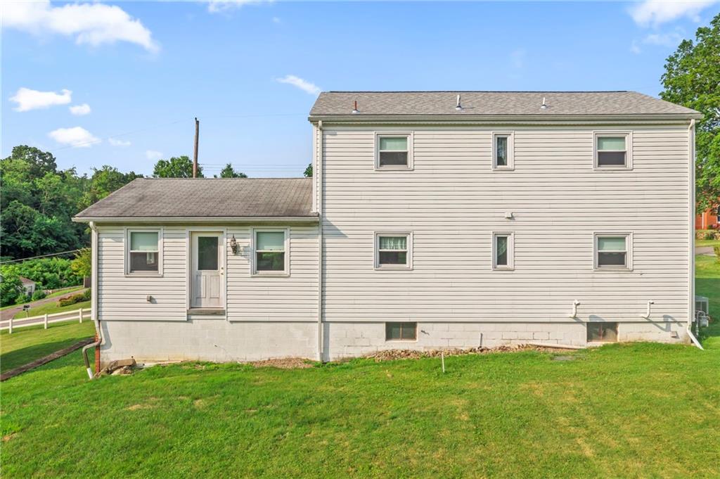17 Ellen Drive McKees Rocks, PA 15136 - Photo 23 of 31 a view of a house with a backyard