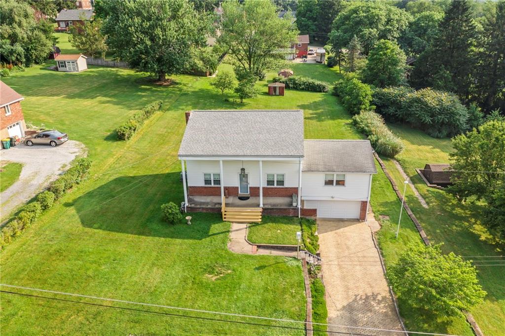 17 Ellen Drive McKees Rocks, PA 15136 - Photo 29 of 31 an aerial view of a house with swimming pool garden and patio