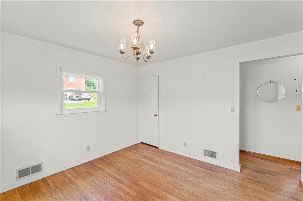 17 Ellen Drive McKees Rocks, PA 15136 - Photo 10 of 31 a view of an empty room with wooden floor