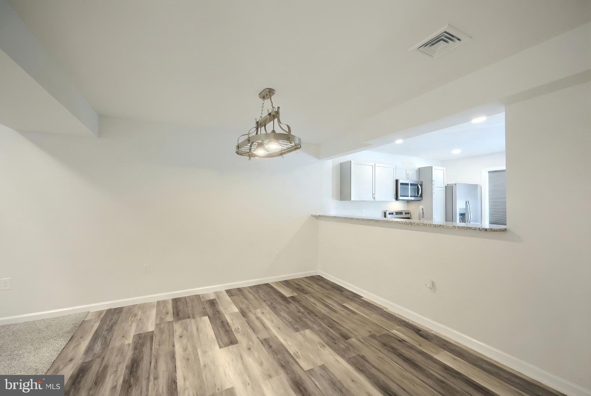 1885 Stoverstown Road, Unit 9 Spring Grove, PA 17362 - Photo 11 of 29 Modern open space with stylish lighting.