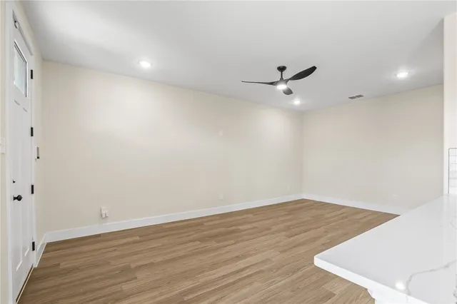 a bathroom with a sink a mirror and a shower