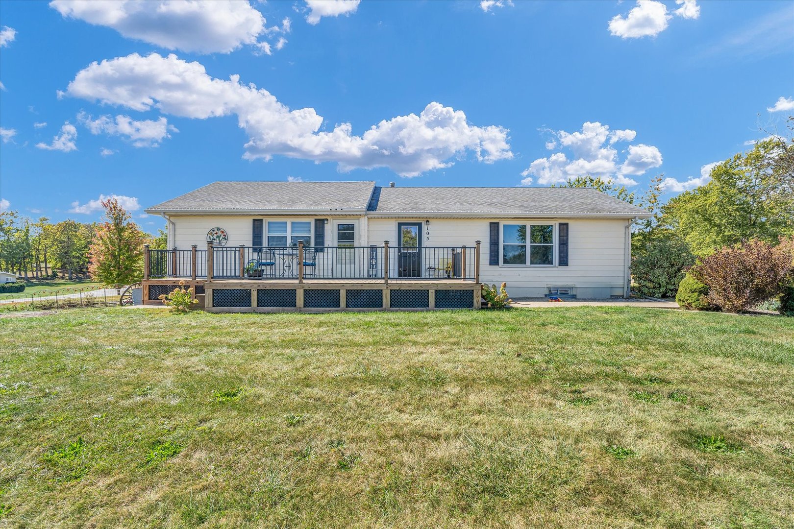 105 Crow Court Loda, IL 60948 - Photo 1 of 1 a view of a house with a big yard and large trees