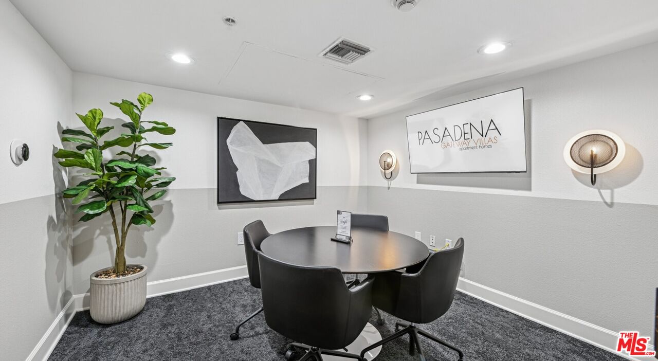 290 North Hudson Avenue, Unit 102W Pasadena, CA 91101 - Photo 5 of 21 a dining room with furniture and potted plant