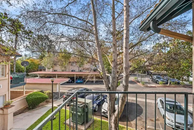 a view of balcony with furniture