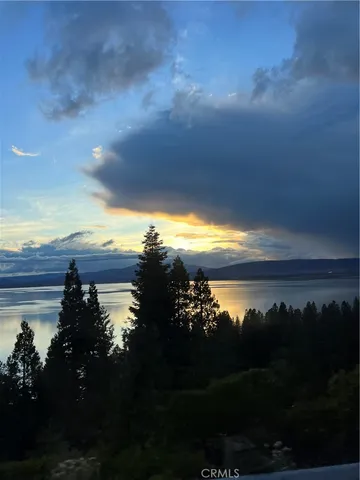 a view of a lake in middle of the house
