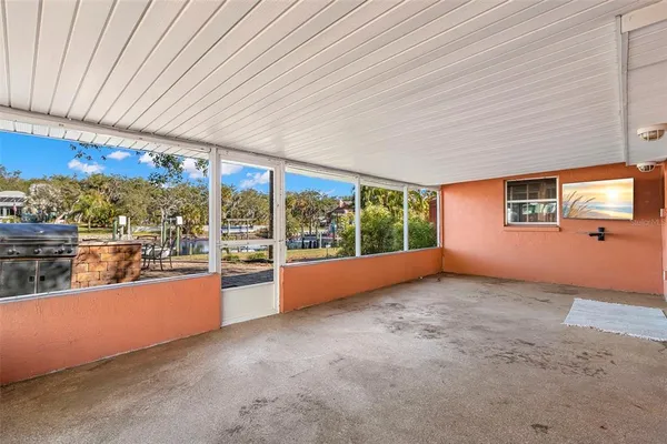 a view of an empty room with a balcony