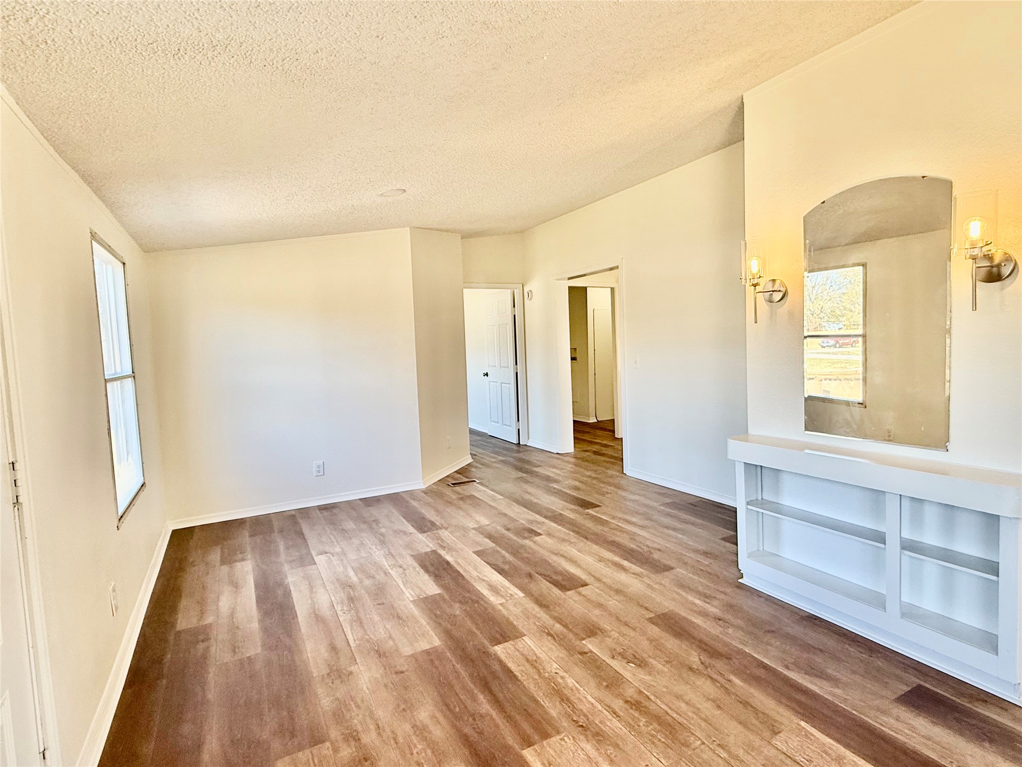 21614 County Road 3747 Splendora, TX 77372 - Photo 3 of 32 Entry with built in shelves - smaller flex space/sitting area to the left