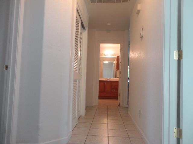 521 W West 9th Street Merced, CA 95341 - Photo 9 of 21 a view of a bathroom from the hallway