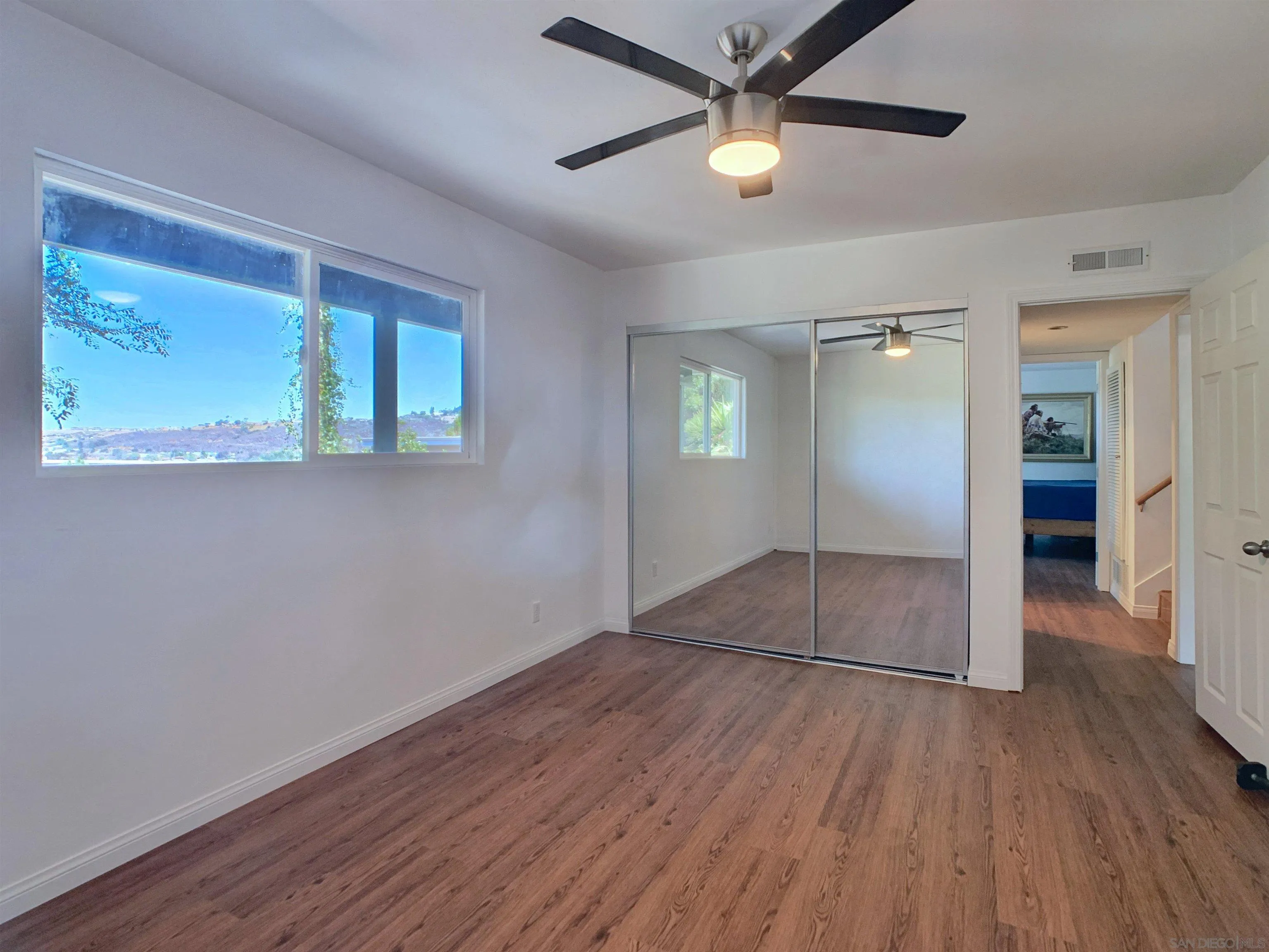 3606 Hartzel Drive Spring Valley, CA 91977 - Photo 57 of 75 2nd bedroom with mirrored closet doors