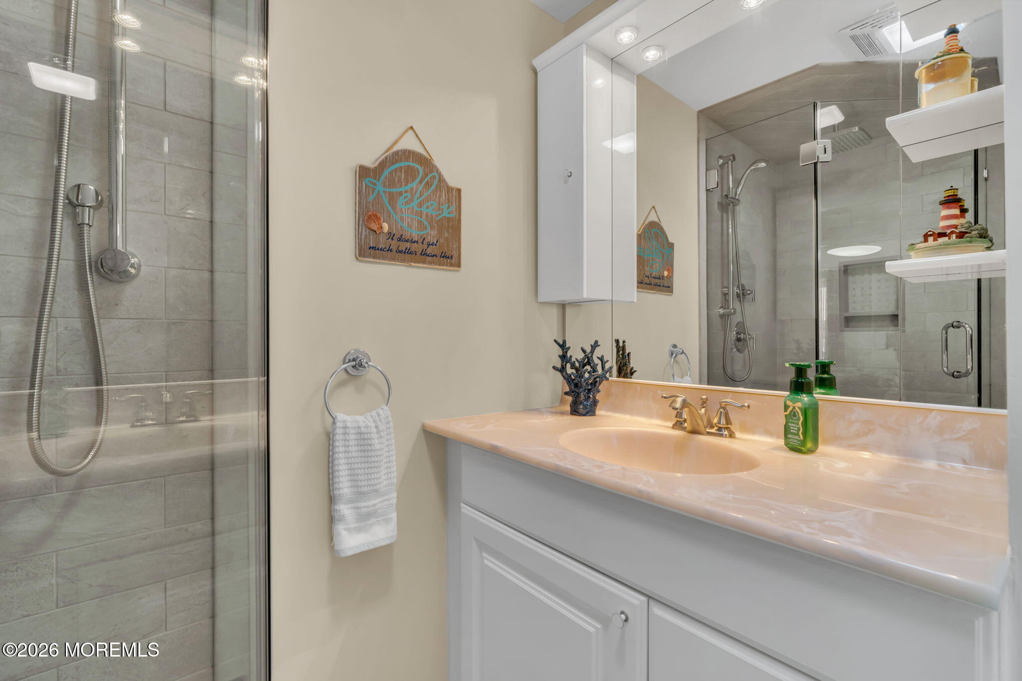 13 Jolly Roger Way Waretown, NJ 08758 - Photo 54 of 87 a bathroom with a granite countertop sink a shower and a mirror