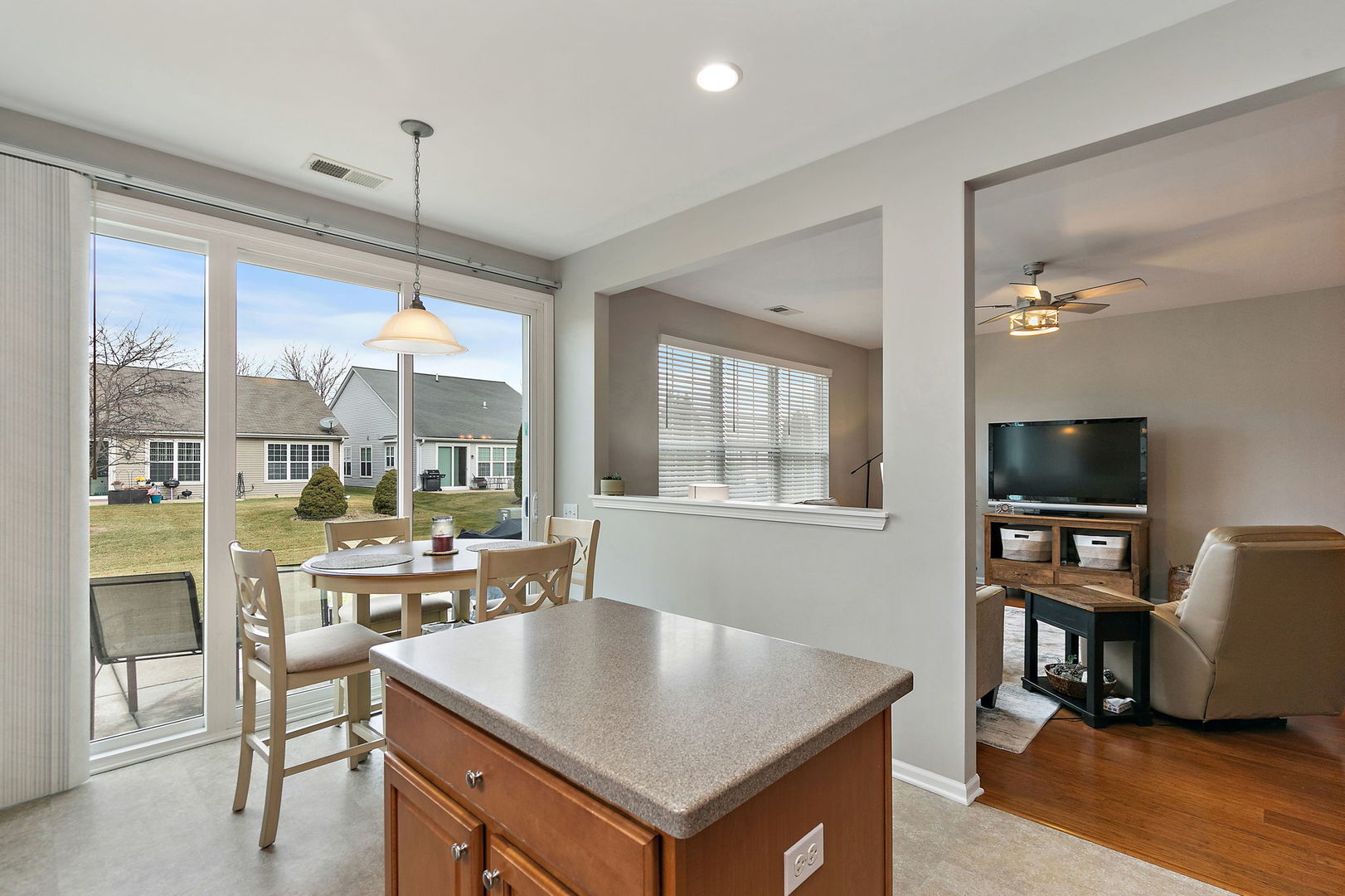 Undisclosed Address Elgin, IL 60124 - Photo 11 of 35 a view of a workspace with furniture and a window