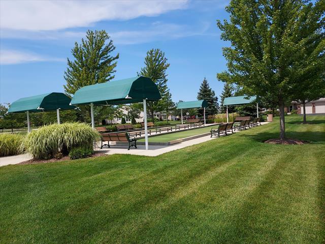 Undisclosed Address Elgin, IL 60124 - Photo 28 of 35 a view of a park with slide