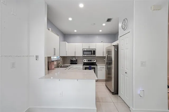 $590,000 | 7634 Northwest 114th Path, Doral, FL 33178