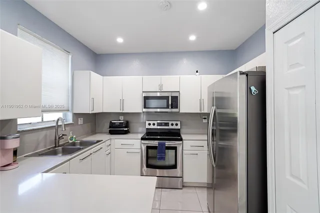 $590,000 | 7634 Northwest 114th Path, Doral, FL 33178