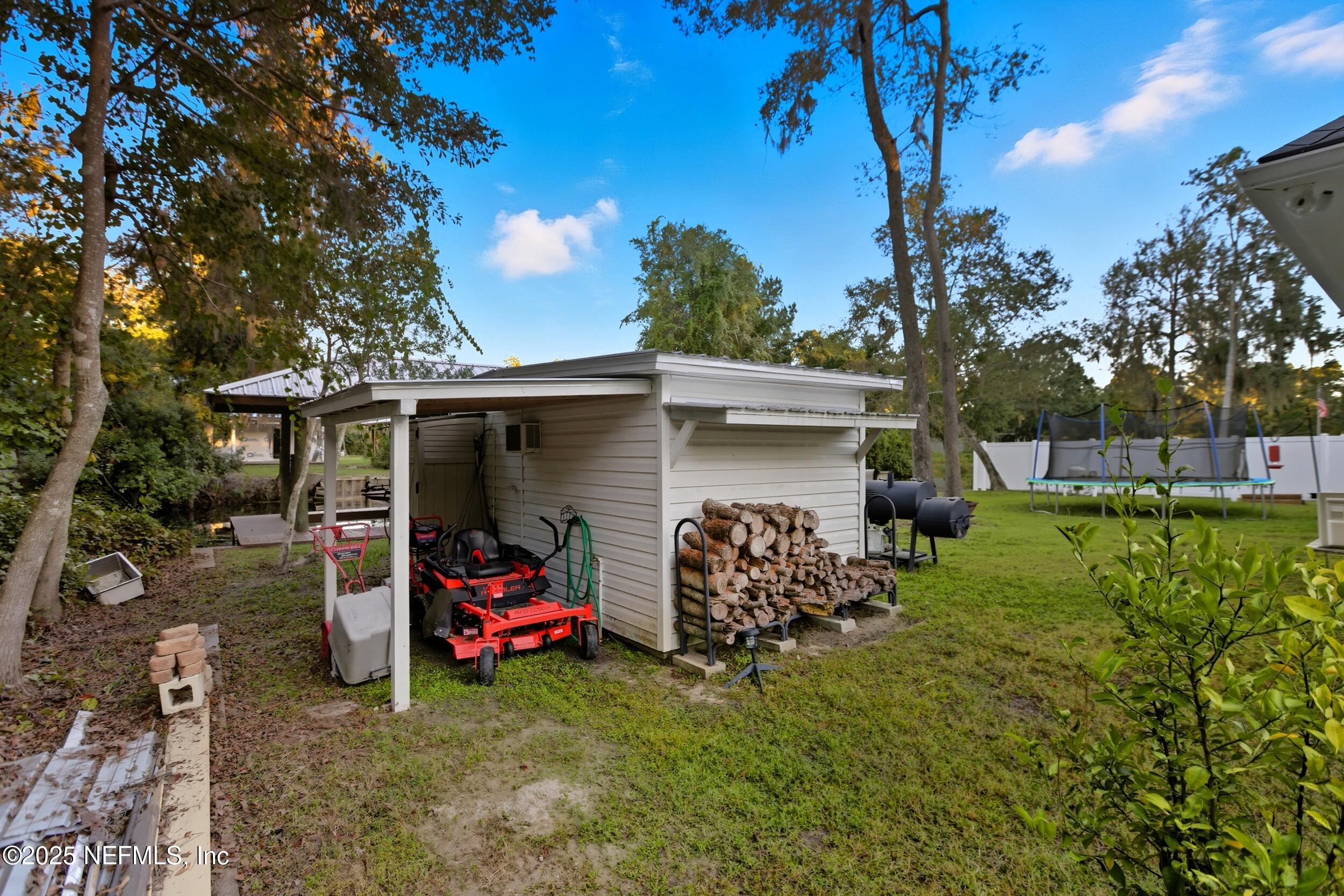 128 Santa Rosa Street Florahome, FL 32140 - Photo 43 of 57 Side Of Shed