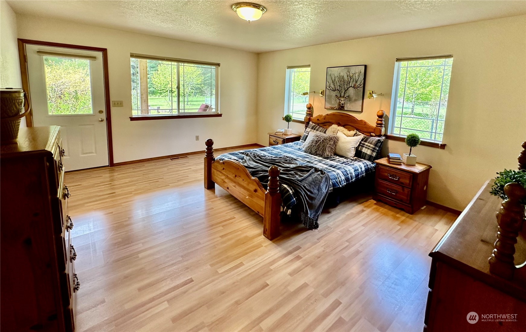778 Ceres Hill Road, Unit B Chehalis, WA 98532 - Photo 17 of 40 a bedroom with furniture and a wooden floor