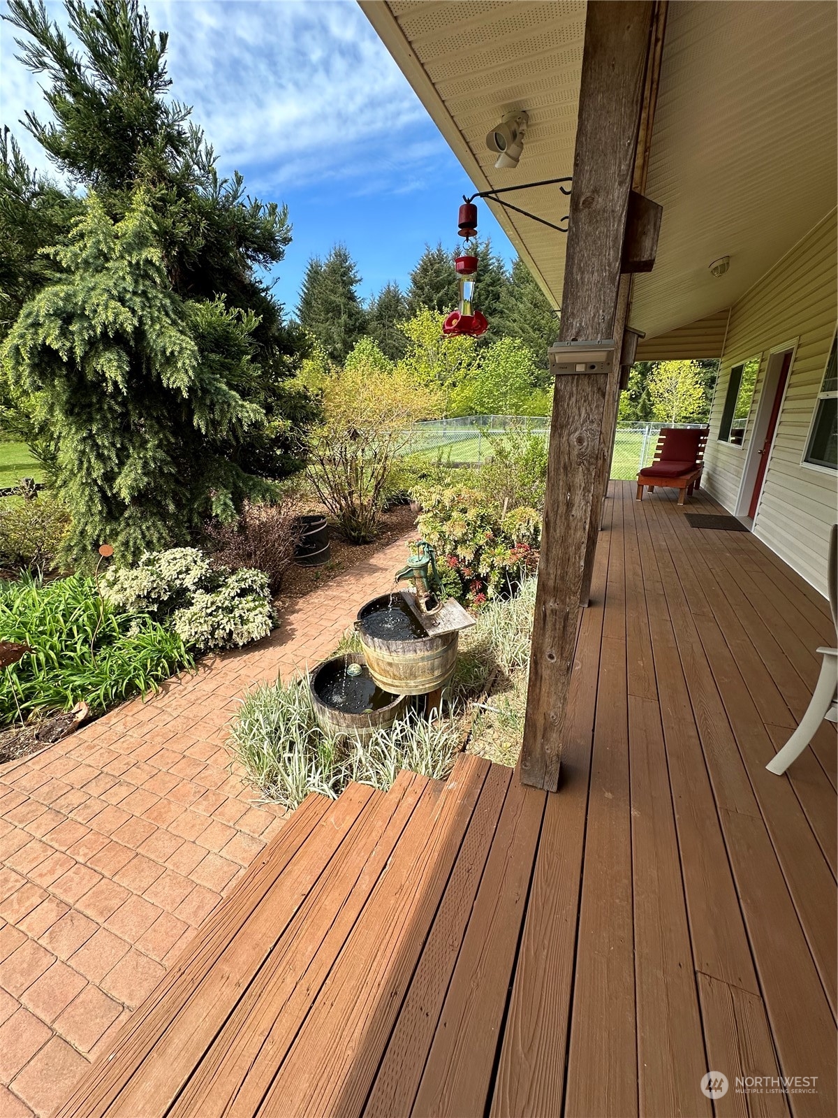 778 Ceres Hill Road, Unit B Chehalis, WA 98532 - Photo 21 of 40 a view of a couches on the deck with wooden floor