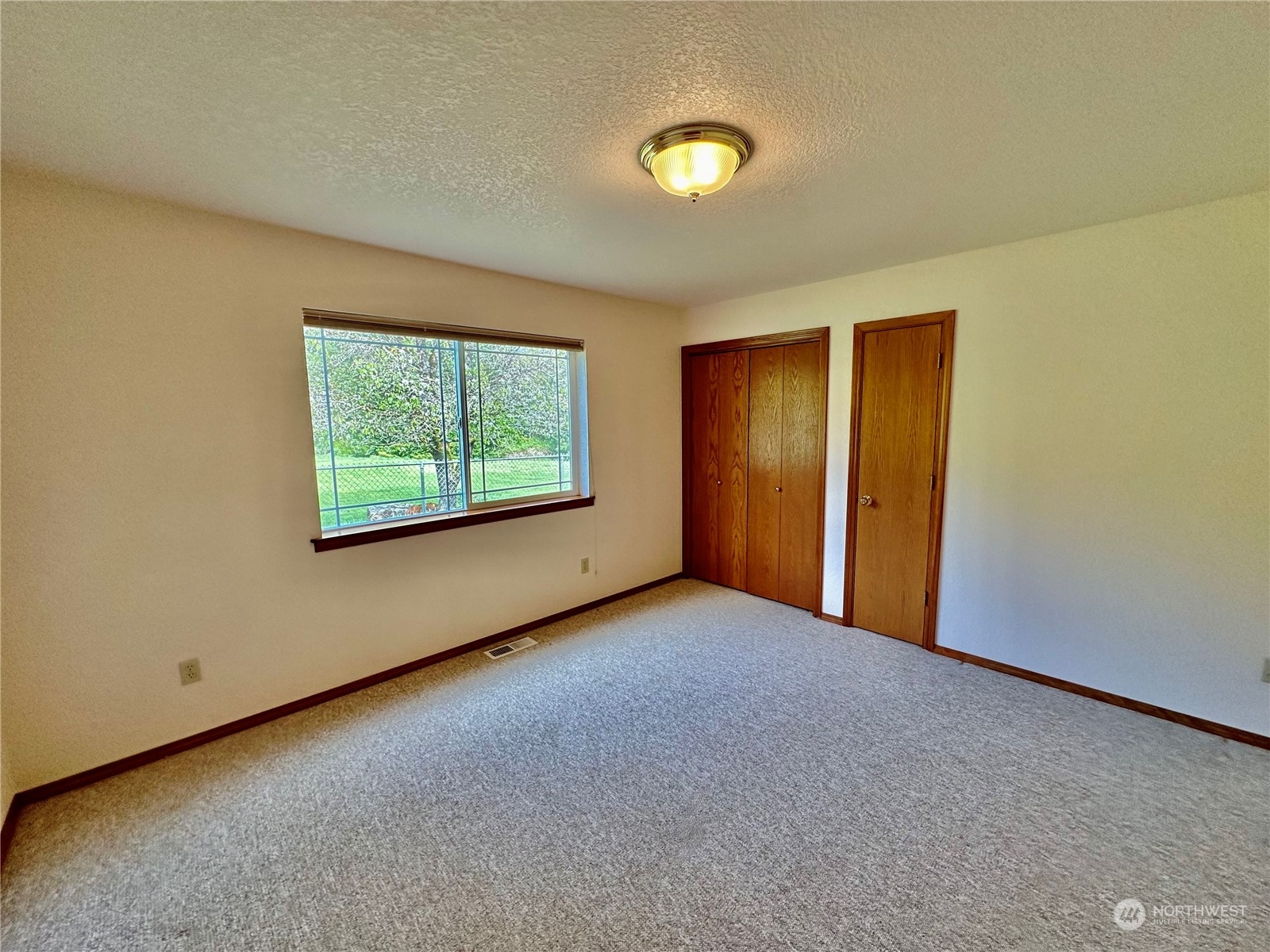 778 Ceres Hill Road, Unit B Chehalis, WA 98532 - Photo 22 of 40 an empty room with windows