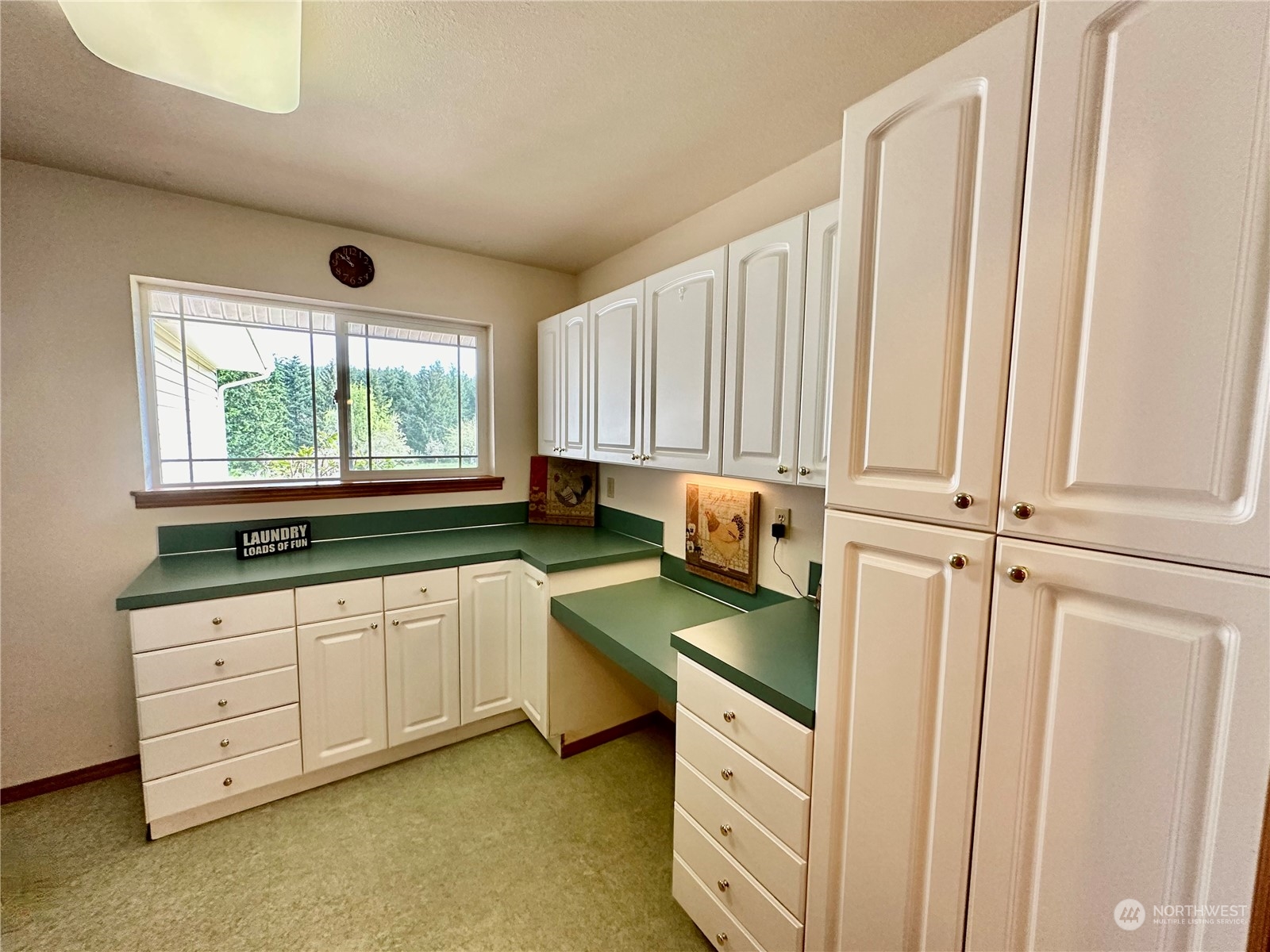 778 Ceres Hill Road, Unit B Chehalis, WA 98532 - Photo 30 of 40 a kitchen with stainless steel appliances a sink and a window