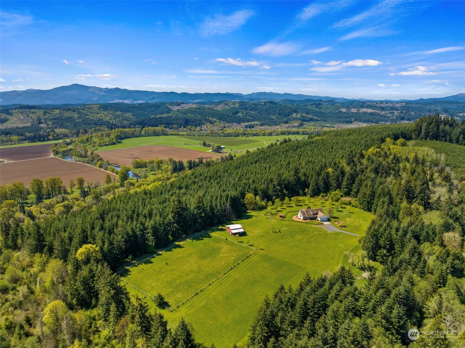 778 Ceres Hill Road, Unit B Chehalis, WA 98532 - Photo 39 of 40 a view of a lake with a mountain in the background