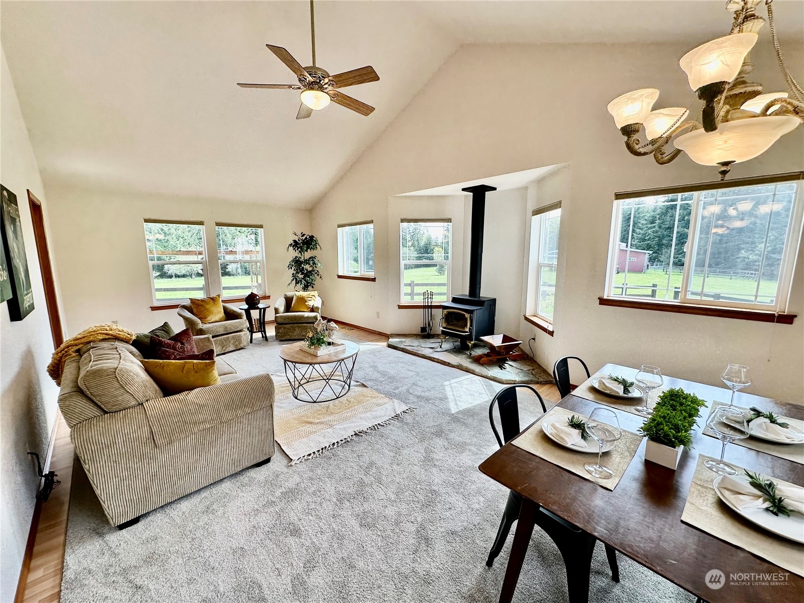 778 Ceres Hill Road, Unit B Chehalis, WA 98532 - Photo 8 of 40 a living room with furniture a chandelier and a large window