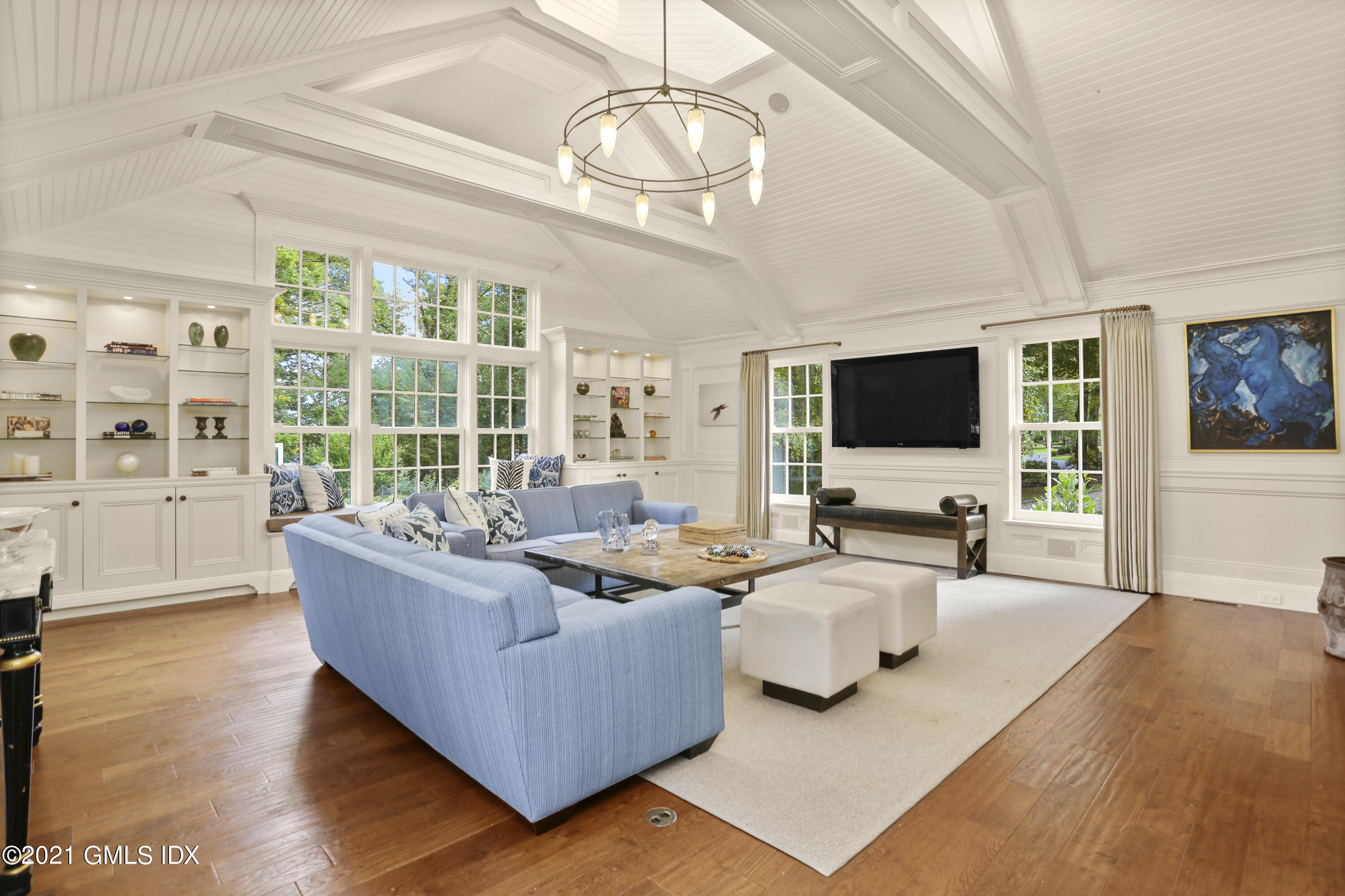 5 Tinker Lane Greenwich, CT 06830 - Photo 13 of 44 a living room with furniture and a flat screen tv