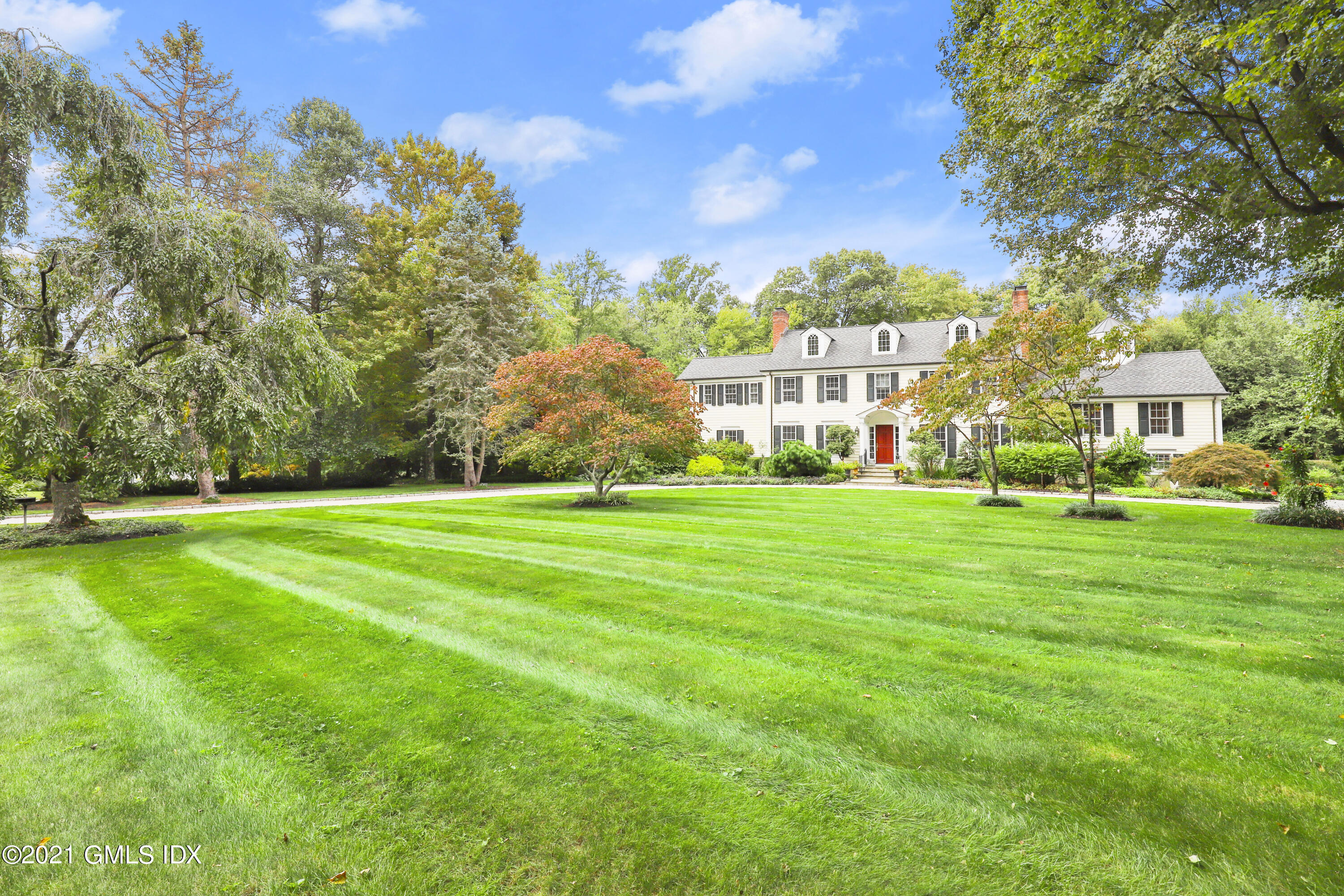 5 Tinker Lane Greenwich, CT 06830 - Photo 2 of 44 a view of house with garden