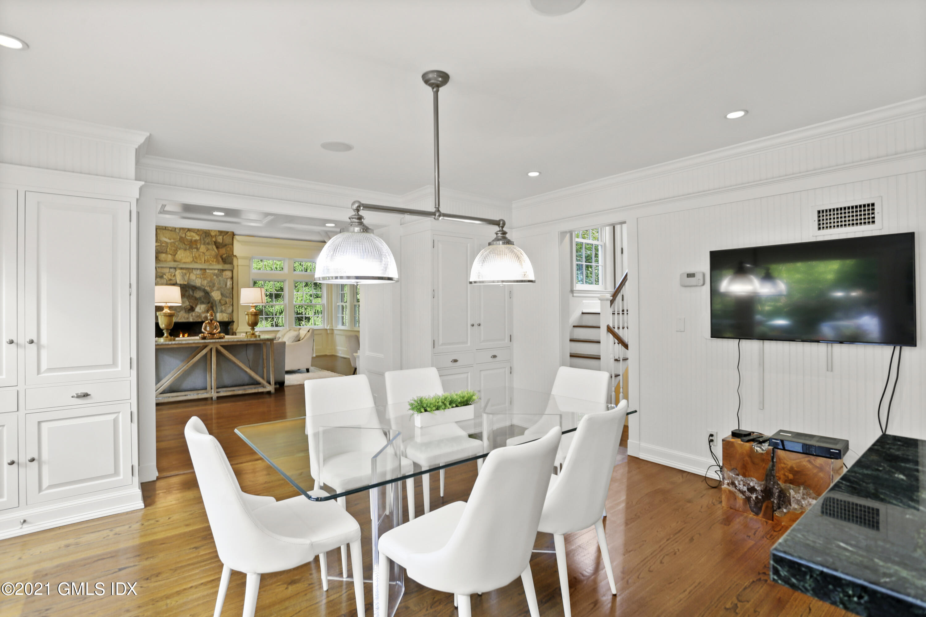 5 Tinker Lane Greenwich, CT 06830 - Photo 21 of 44 a living room with furniture and a flat screen tv