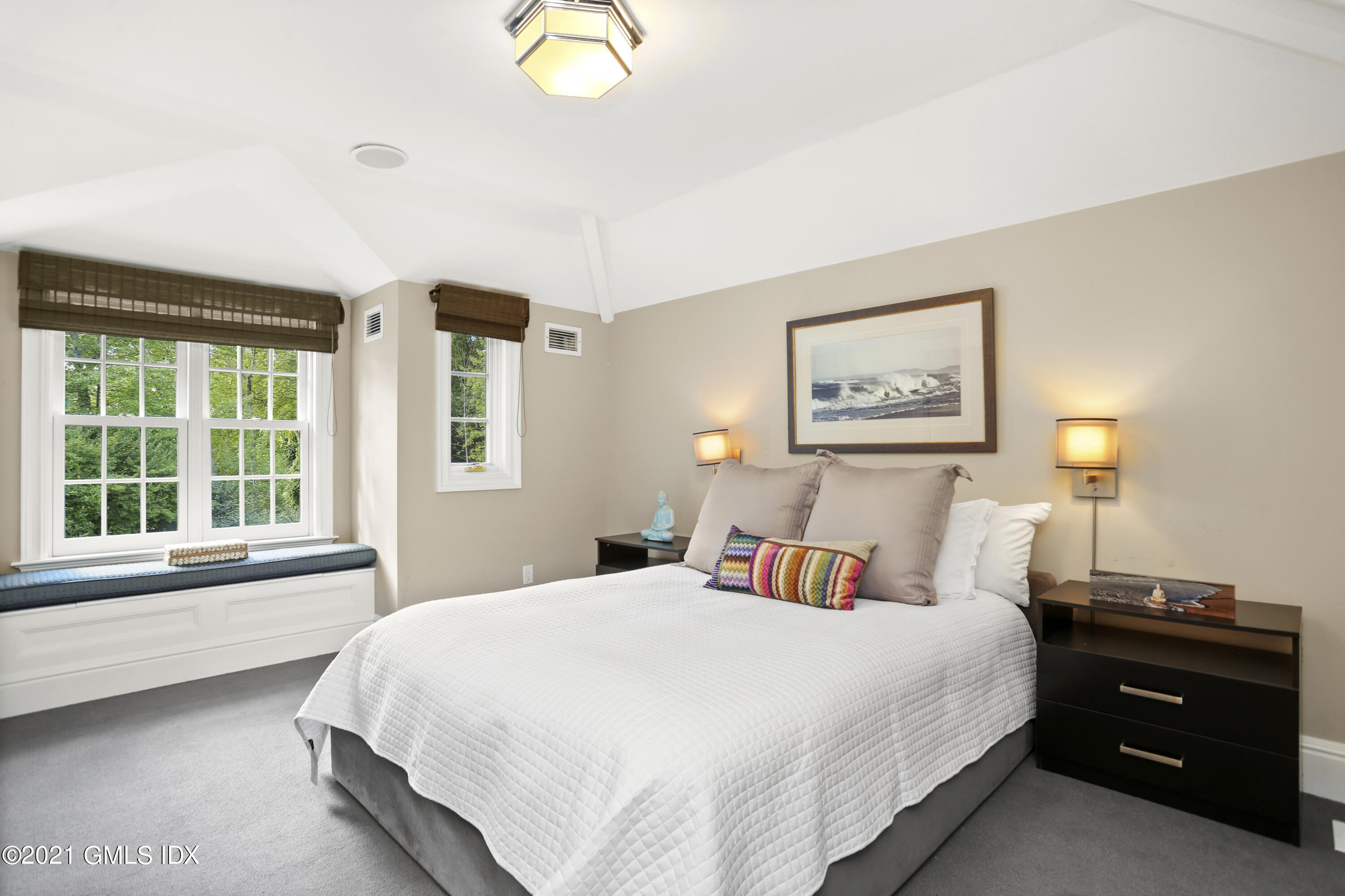 5 Tinker Lane Greenwich, CT 06830 - Photo 30 of 44 a bedroom with a bed and a window