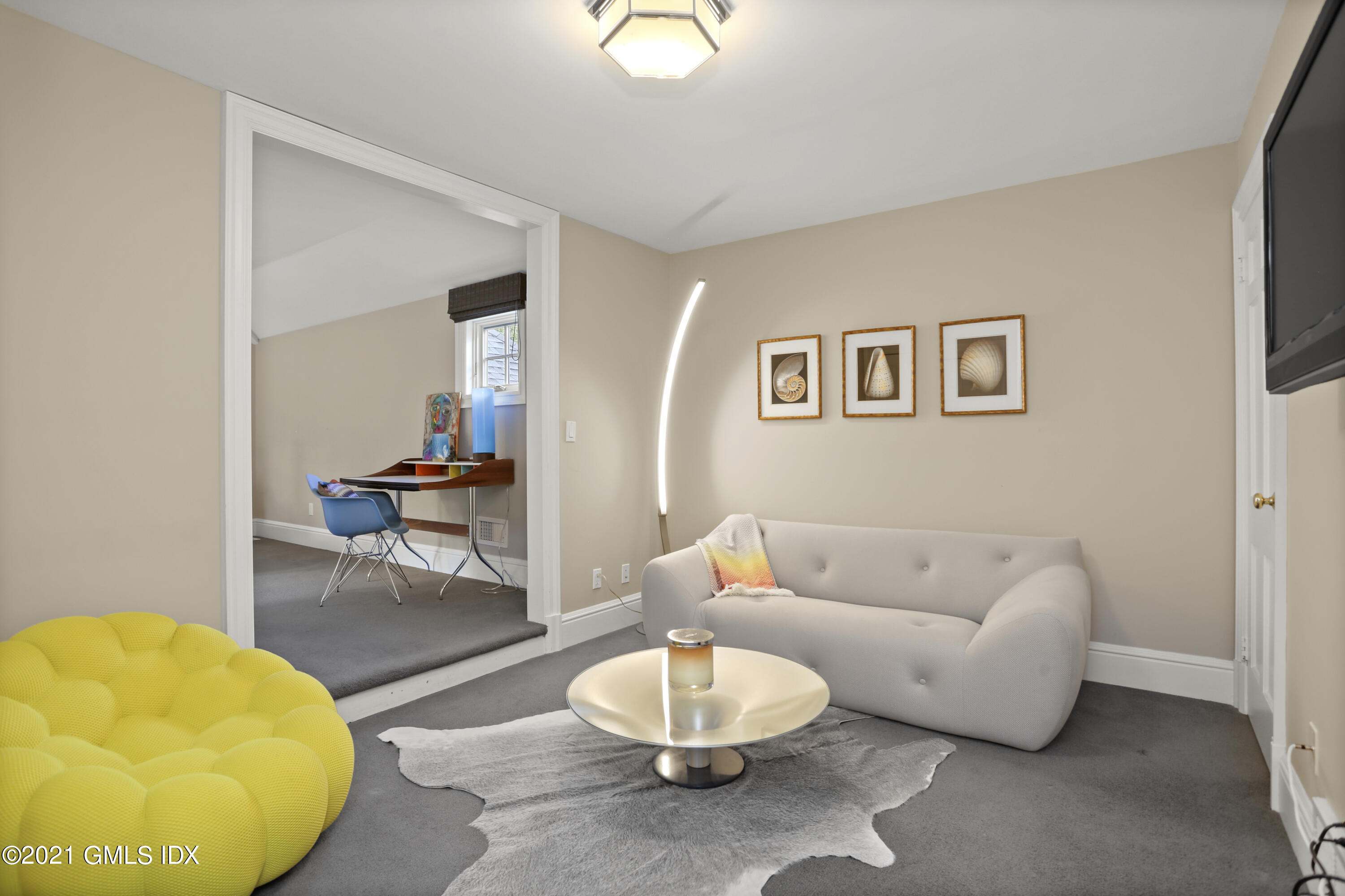 5 Tinker Lane Greenwich, CT 06830 - Photo 31 of 44 a living room with furniture and a lamp