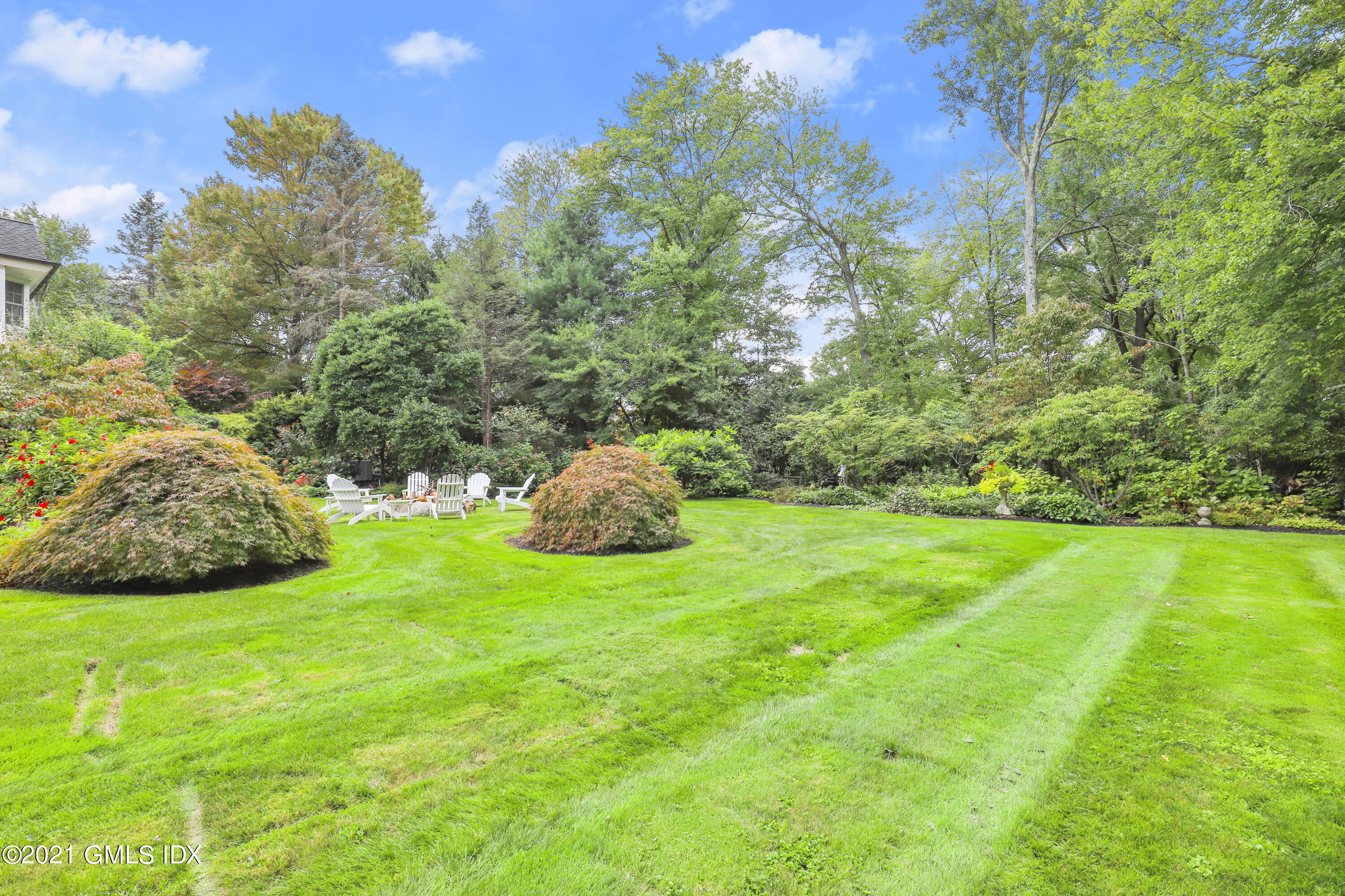 5 Tinker Lane Greenwich, CT 06830 - Photo 40 of 44 a view of an outdoor space and a yard
