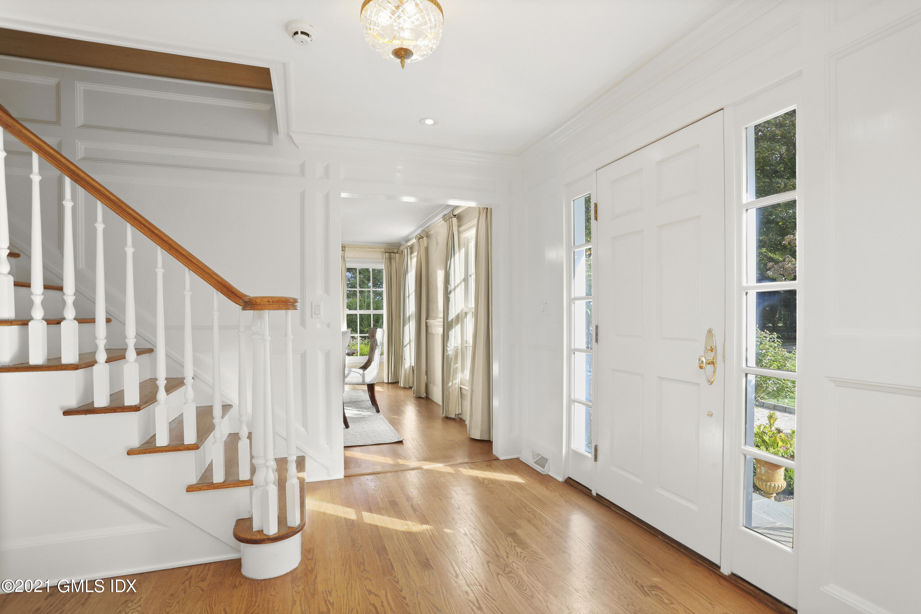 5 Tinker Lane Greenwich, CT 06830 - Photo 10 of 44 a view of entryway and hall with wooden floor