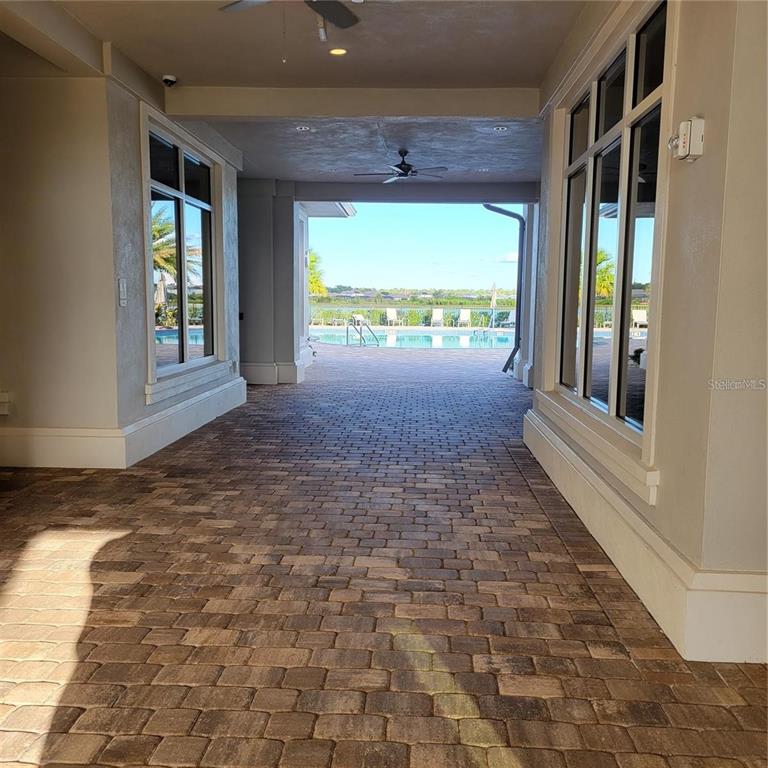 17335 Blue Ridge Place Bradenton, FL 34211 - Photo 31 of 44 a view of empty room with floor to ceiling window