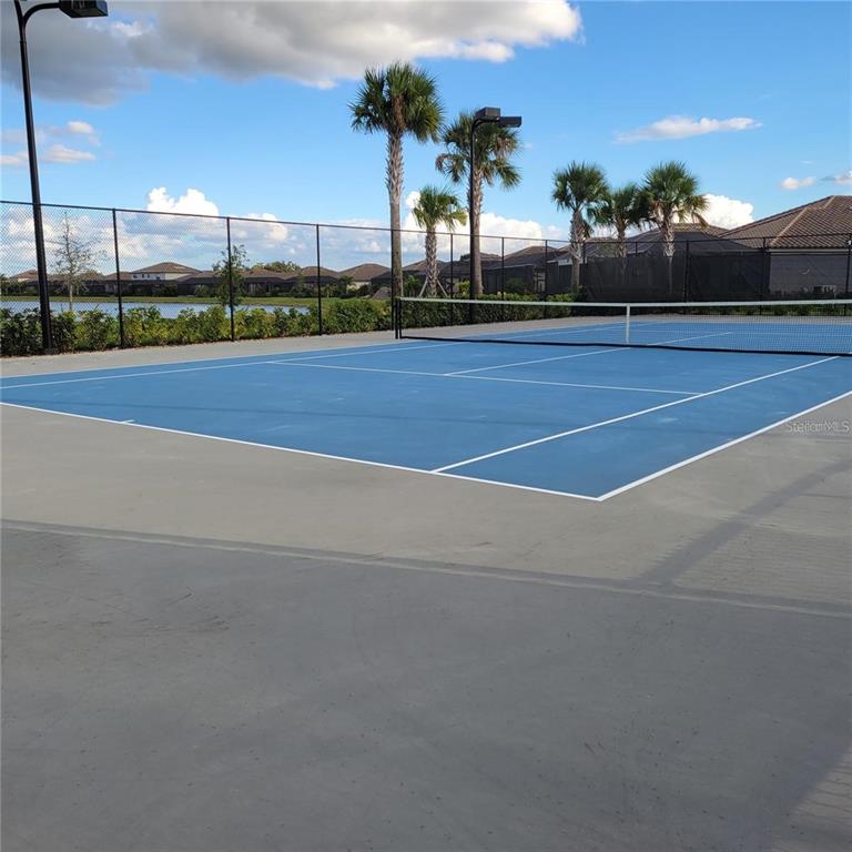 17335 Blue Ridge Place Bradenton, FL 34211 - Photo 41 of 44 a view of an outdoor space and tennis court