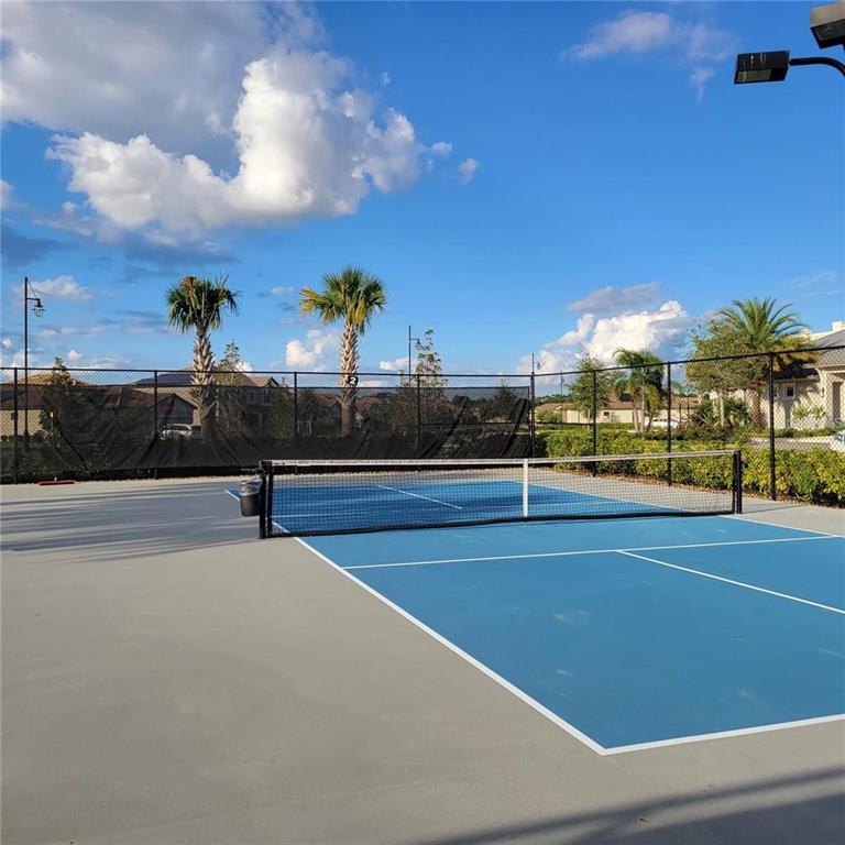 17335 Blue Ridge Place Bradenton, FL 34211 - Photo 43 of 44 a view of a tennis court