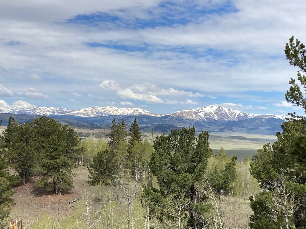 593 Osprey Road Como, CO 80432 - Photo 8 of 32 a view of a lake with a mountain in the background