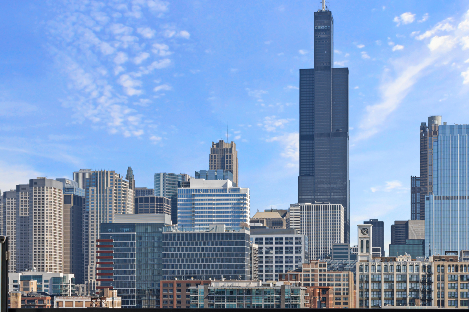305 South Racine Avenue, Unit PHD Chicago, IL 60607 - Photo 42 of 49 a city view with tall buildings