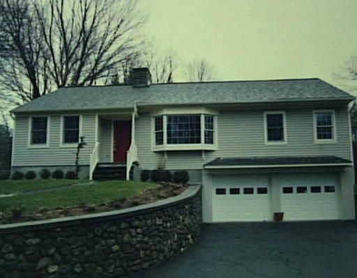 138 Codfish Hill Road Bethel, CT 06801 - Photo 1 of 1 a front view of a house with a garden