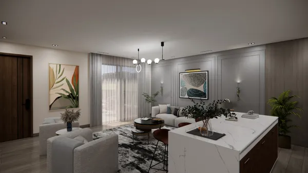 a living room with furniture and potted plant