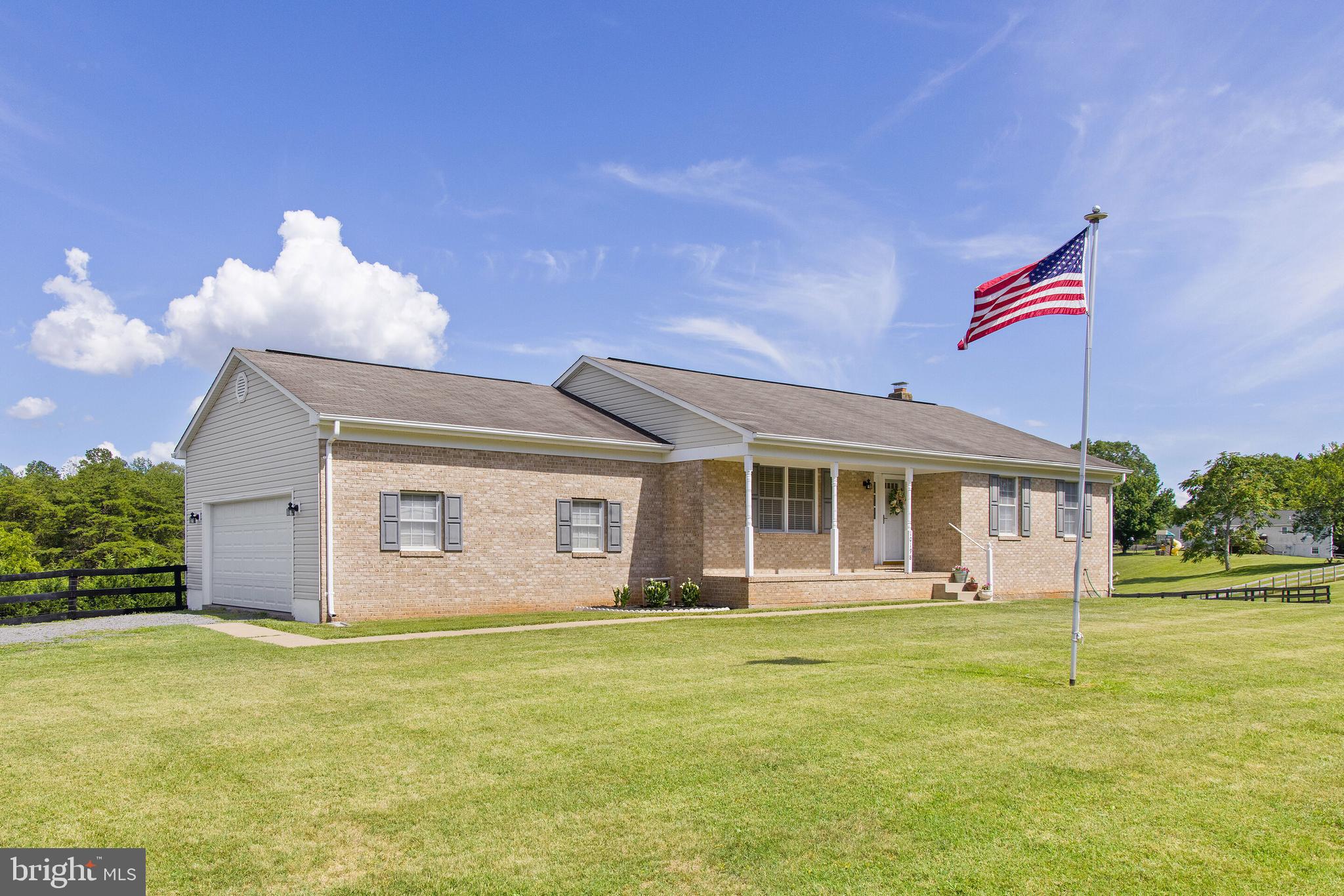 10198 Routs Ridge Lane Warrenton, VA 20186 - Photo 2 of 35 Brick-Front Home w/ Porch & 2-Car Garage