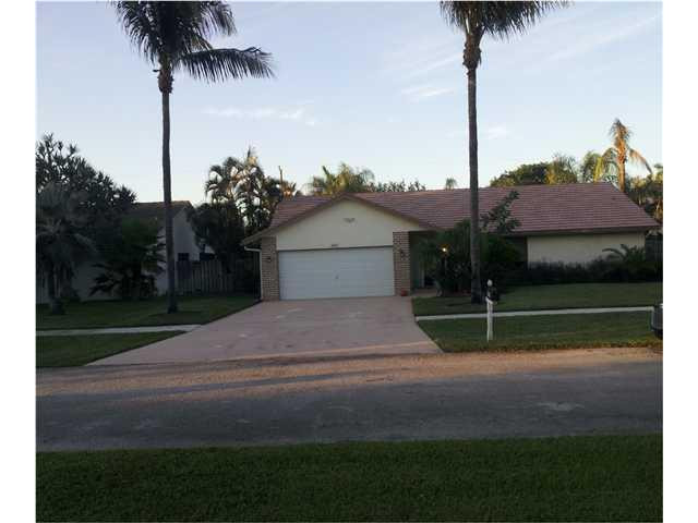 a house view with a garden space