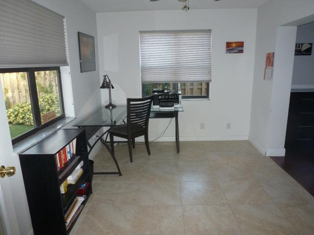 417 Apache Lane Boca Raton, FL 33487 - Photo 7 of 13 a workspace with furniture and window
