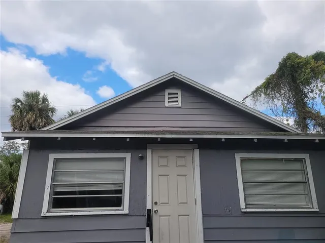 a front view of a house with garage