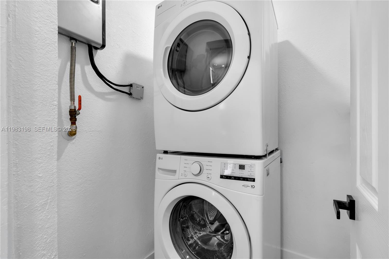 7501 Raleigh Street Hollywood, FL 33024 - Photo 15 of 21 a utility room with dryer and washer