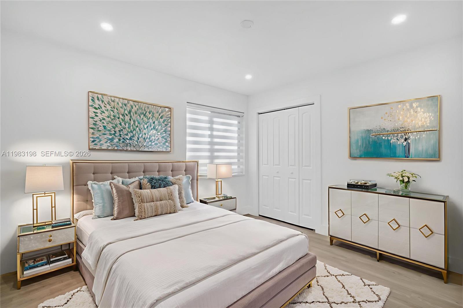 7501 Raleigh Street Hollywood, FL 33024 - Photo 7 of 21 a bedroom with a bed and a window