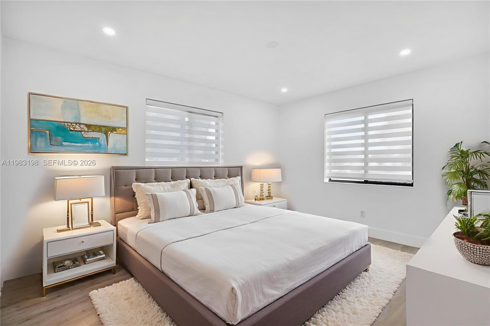 7501 Raleigh Street Hollywood, FL 33024 - Photo 8 of 21 a bedroom with a bed and a window